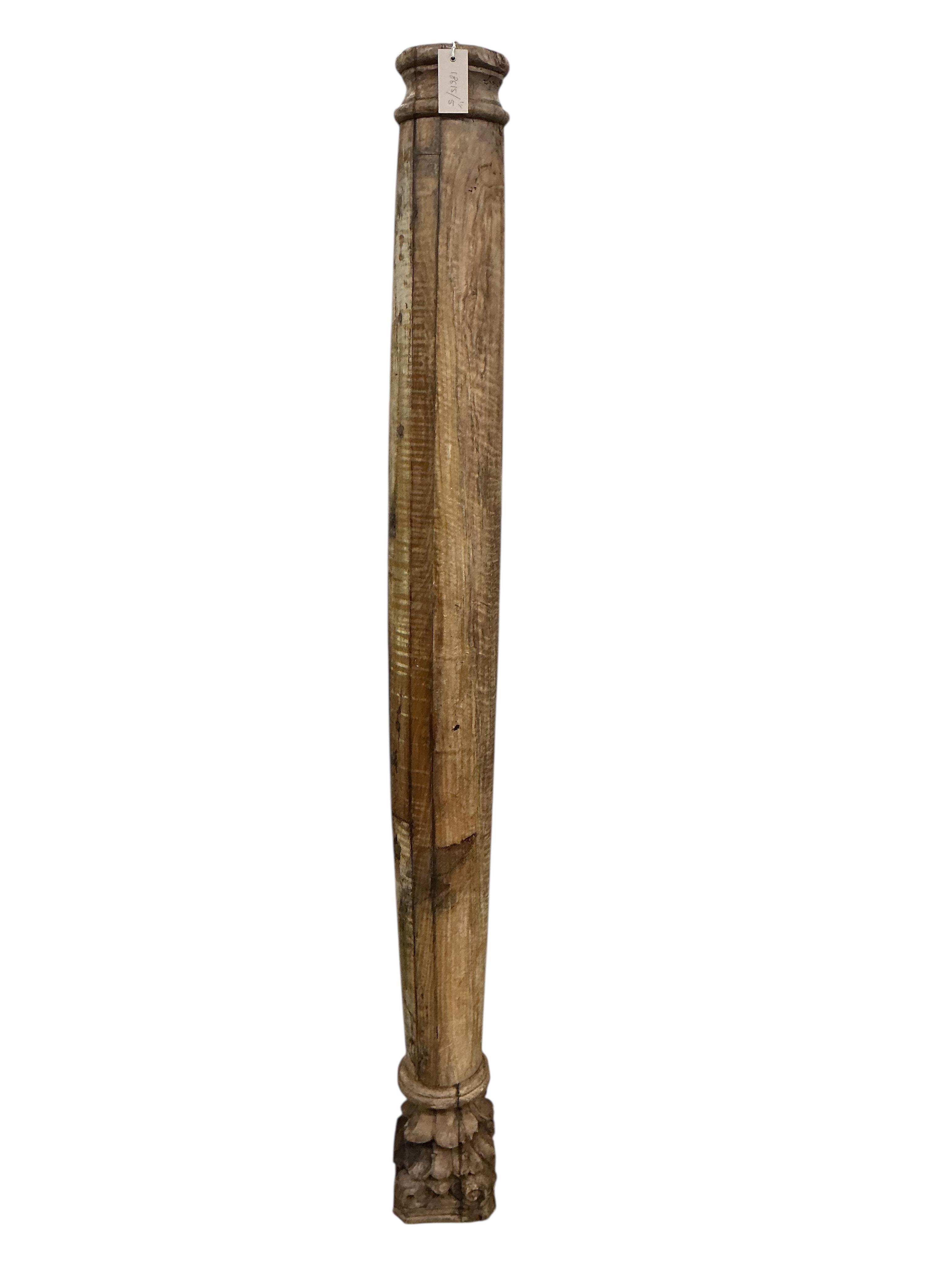 Two North Afrcian architectural carved wood columns, height 172cm